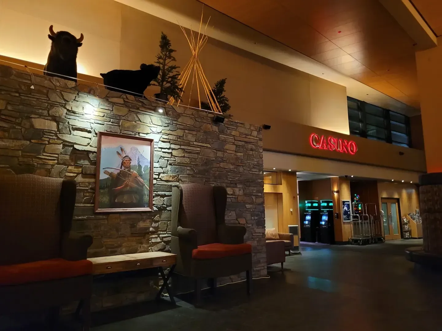 Lobby lounge with stone feature wall at Stoney Nakoda Resort & Casino, Kananaskis